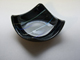 Black with iridescent lines square bowl